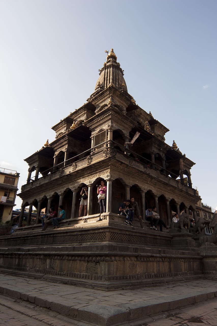 India temple worship – devotees inside a Hindu temple at prayer time